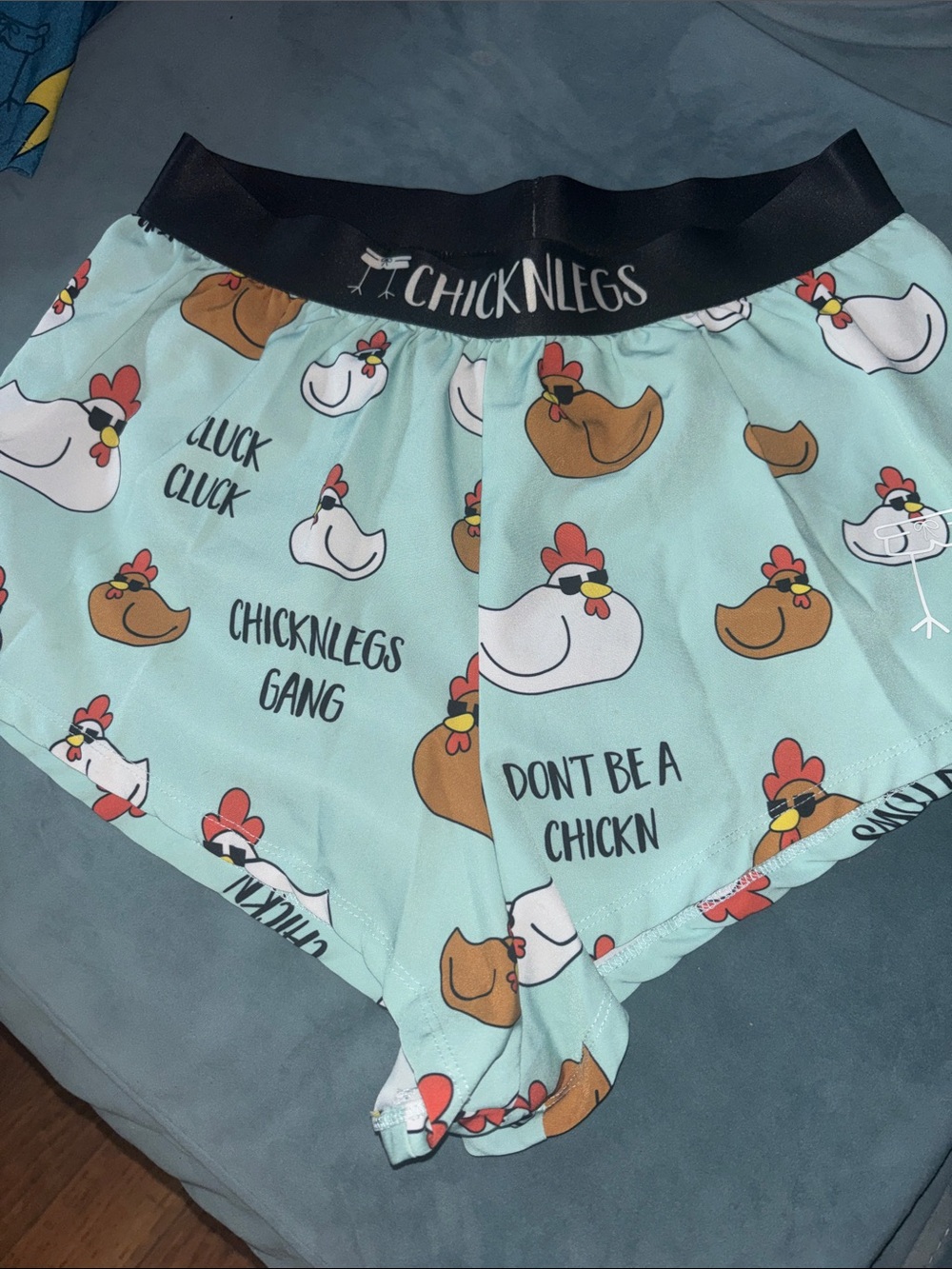 Chicknlegs Men’s Light Blue Chicken-Print Athletic Shorts